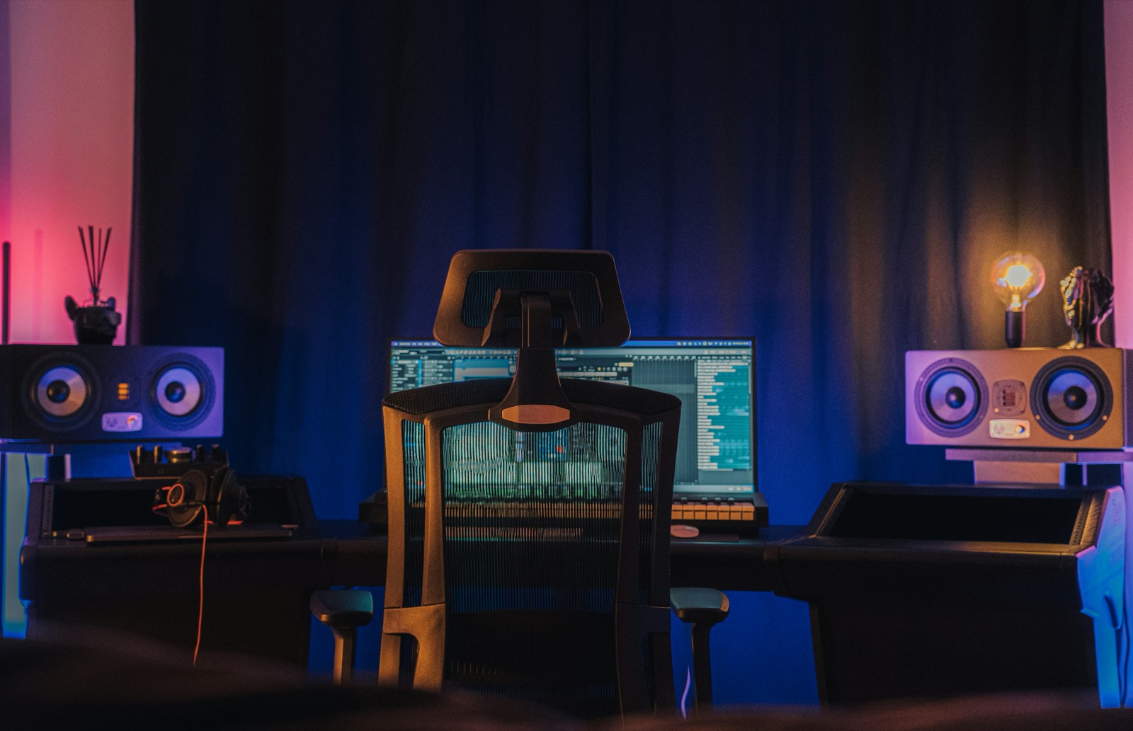 Music production desk with studio monitor speakers